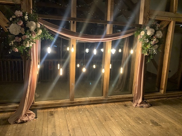 Rustic Frame With Hanging Edison Bulbs Backdrop