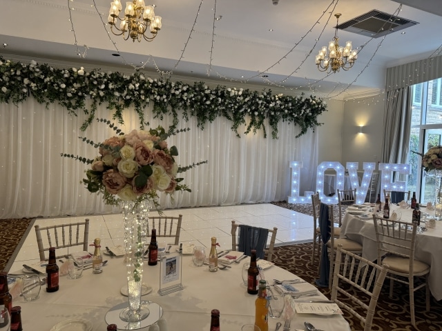 Starlight Backdrop with Silk Green Floral Top Runner