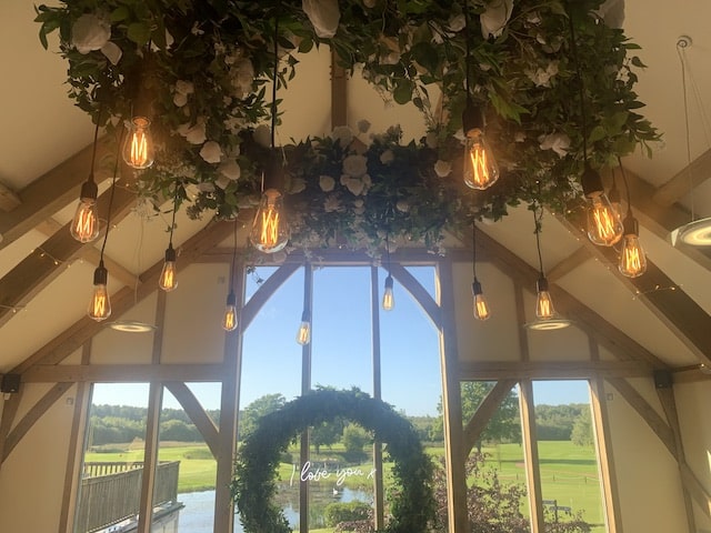 Fairy Lights Around All 7 Beams With Silk Greenery With Pops Of Neutral Tones Edison Bulb Floral Chandelier