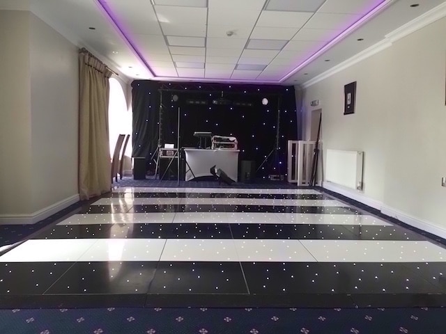 Waterton Park - Boat House - 12 x 16 Black & White Striped Starlight Dance Floor